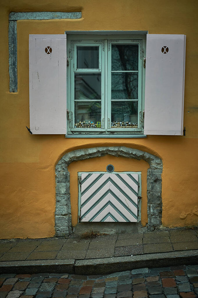 Tallinn, Estonia December 7, 2019 Unique door and window in the old town of the city - Fotoğraf, Görsel