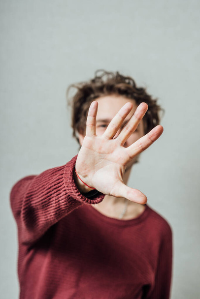 man shows stop gesture - Фото, изображение
