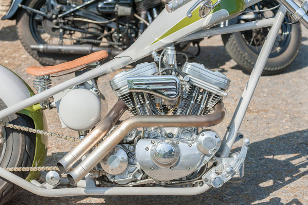 chromed custom motorcycle engine and exhaust pipe closeup - Photo, Image