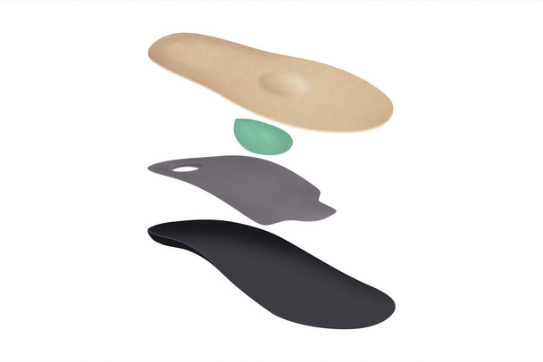 Isolated orthopedic insole on a white background. Treatment and prevention of flat feet and foot diseases. Foot care, comfort for the feet. Wear comfortable shoes. Medical insoles. - 写真・画像
