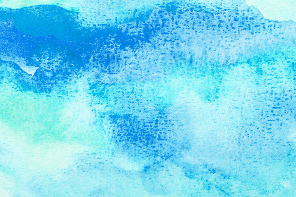Abstract blue watercolor background. The color splashing on the paper. Hand drawn.  - Fotoğraf, Görsel