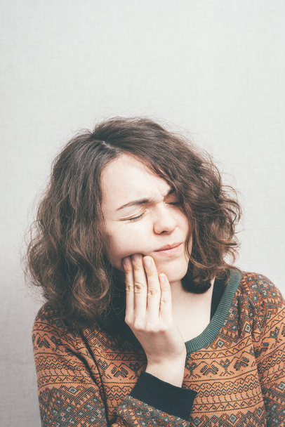 woman toothache against studio background  - Fotografie, Obrázek