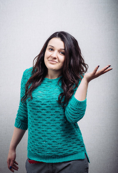 young casual woman with a smile on her face and her arms wide open - Photo, Image