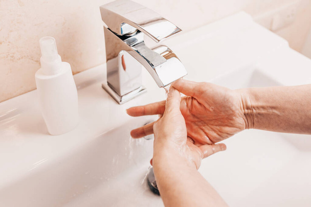 Hygiene stop spreading coronavirus - washing hands rubbing with soap to covid prevention - Foto, Imagem