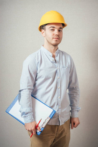 Young foreman take note - 写真・画像