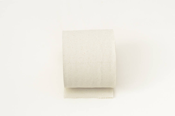 Roll of Toilet paper on white background.Minimalistic style. - Photo, Image