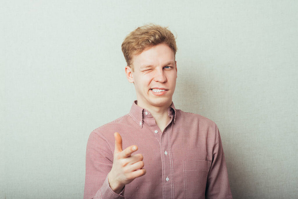 picture of attractive businessman pointing his finger - Фото, зображення