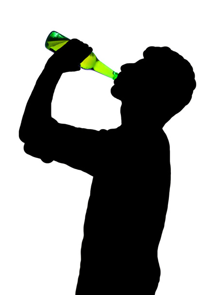 Silhouette of man drinking alcohol - Foto, Imagen