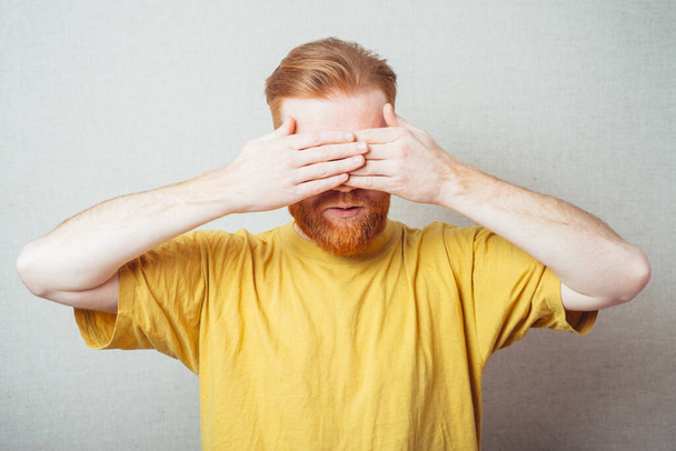 bearded man closes his eyes hands - Foto, Imagen