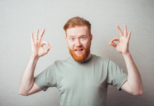 Business idea concept, man shows OK with both hands - Photo, Image