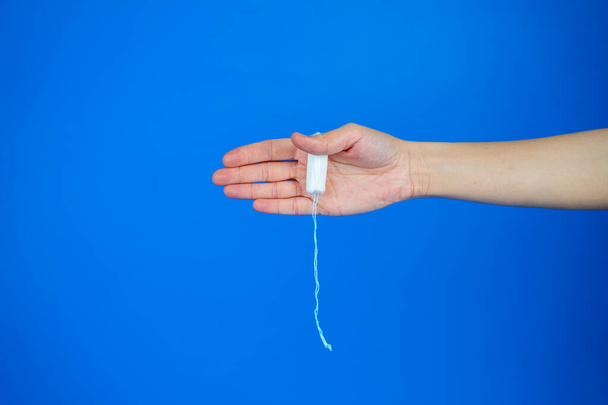 womens health and medicine - tampons in hand - Photo, Image