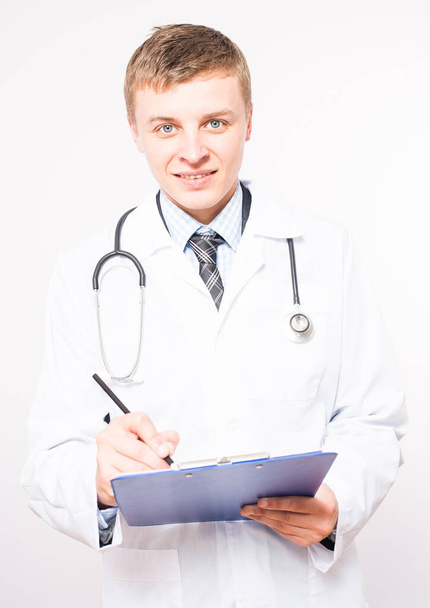 Portrait of an handsome young doctor - Photo, Image