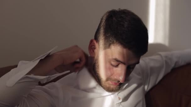 Groom fixes his shirt. Wedding morning. Businessman. Slow motion - Materiał filmowy, wideo