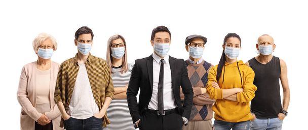 Group of young and older people wearing protective medical face masks isolated on white background - Foto, immagini