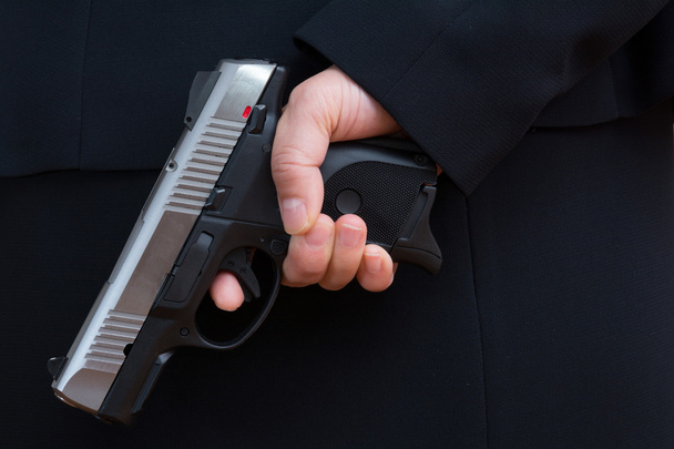 Eli silah tutan kadın - Fotoğraf, Görsel