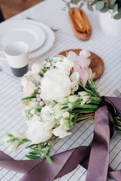 beautiful bridal wedding bouquet on white table - 写真・画像