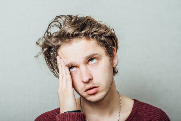 Male headache against studio background - Фото, изображение
