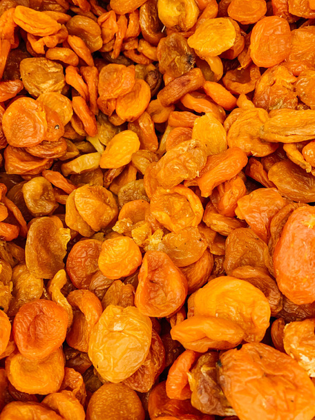 sweet apricot apricot dried apricots as a background - Photo, Image