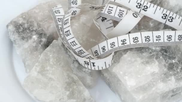 salt and weight gain, large pieces of salt and tape measure, - Footage, Video