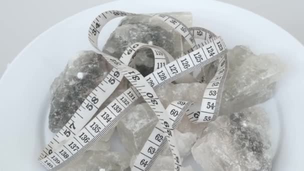 salt and weight gain, large pieces of salt and tape measure, - Footage, Video