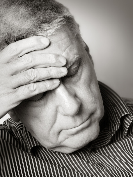 Senior man with a headache - Photo, Image