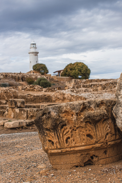 selective focus of ancient ruins in archaeological park near lighthouse  - Fotó, kép