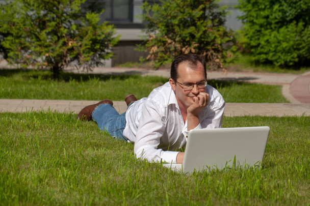 Adult man with laptop - Photo, Image