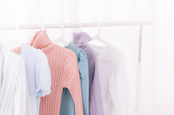 clothes hanging on hangers - Foto, Bild