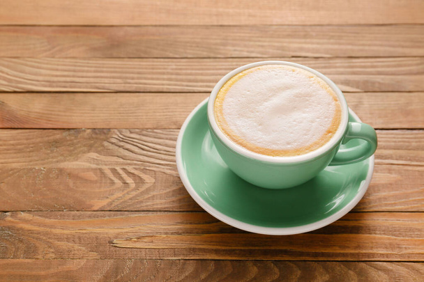 xícara de café quente na mesa de madeira - Foto, Imagem