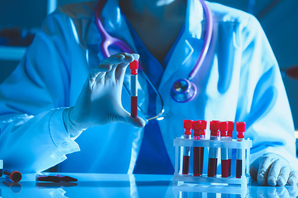 Doctor working with blood samples in laboratory - Zdjęcie, obraz