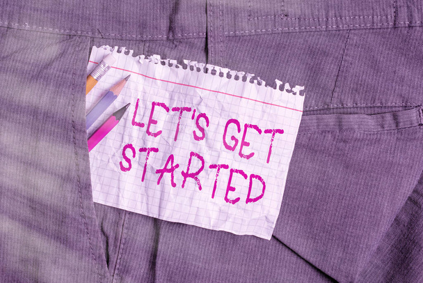 Написання нотатки про "Lets is started". Бізнес фото показує, як почати робити або працювати над тим, що ти почав писати обладнання та білий аркуш паперу в кишені штанів.. - Фото, зображення