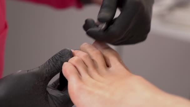 manual removing toenail cuticles using nail  - Footage, Video