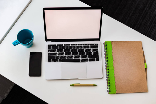 notebook, laptop and phone on the desk - Foto, Imagem