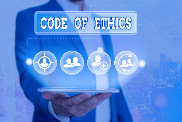 Etikai kódexet mutató szöveges jel. Fogalmi fotó alapvető útmutató a szakmai magatartás és feladatokat ró. - Fotó, kép
