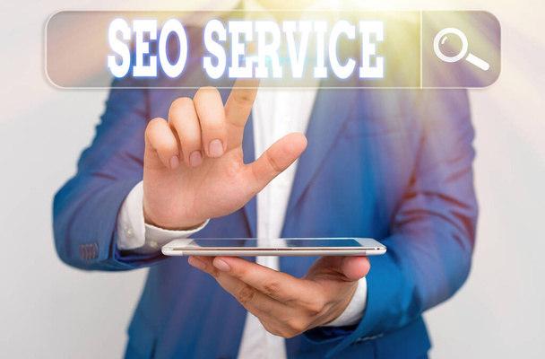 Conceptual hand writing showing Seo Service. Business photo text techniques and procedures to increase the website visibility. - Photo, Image