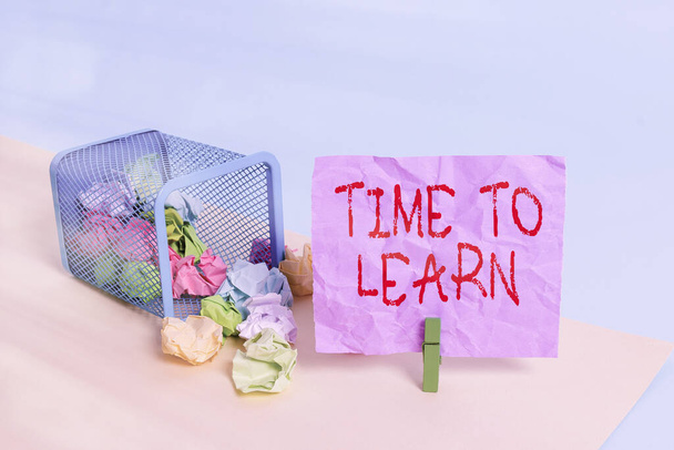 Writing note showing Time To Learn. Business photo showcasing the need to get knowledge or understanding of facts and ideas Trash bin crumpled paper clothespin reminder office supplies. - Photo, Image