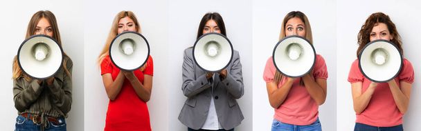 Set of young women over white background shouting through a megaphone - Photo, Image