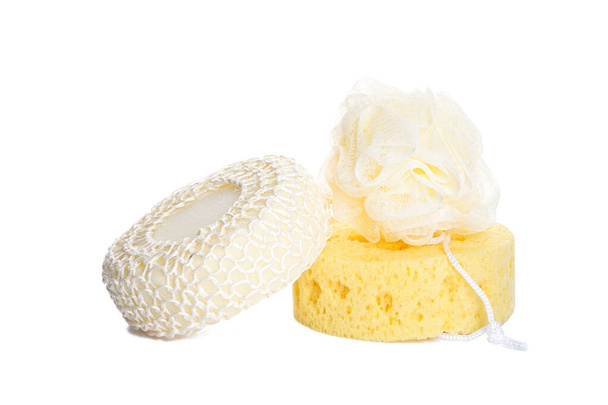 Three different bath sponges isolated on a white background. Bath accessories. Hygiene products. Set of bath accessories. - Photo, Image