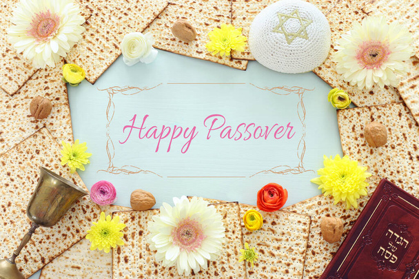 Pesah celebration concept (jewish Passover holiday). Traditional book with text in hebrew: Passover Haggadah (Passover Tale) - Photo, image