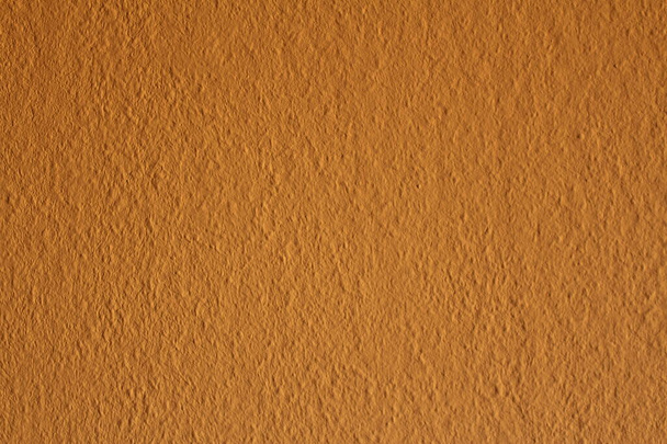 Colorful and flat wall texture with small spots as background - Fotó, kép