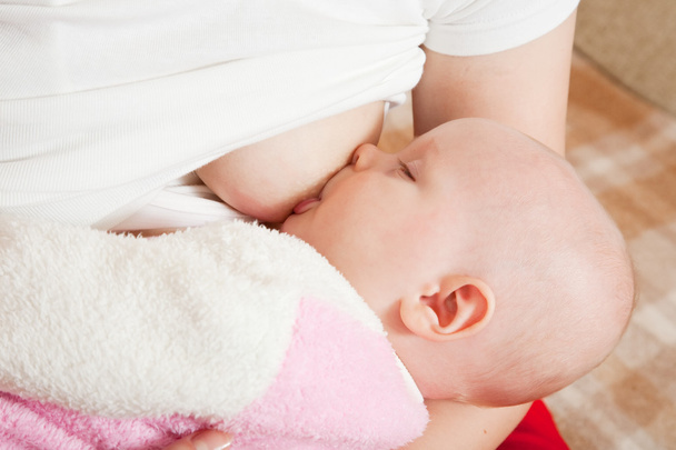 Baby breast feeding - Фото, зображення