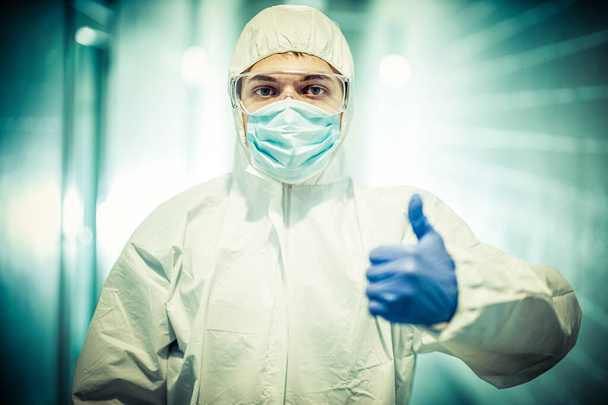 corona virus concept. male doctor showing thumb up - Valokuva, kuva