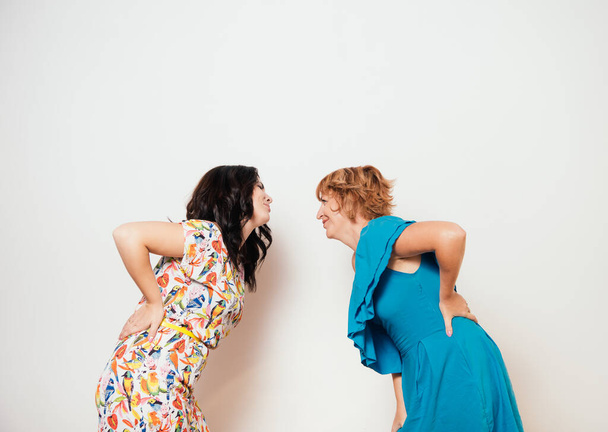 Two women with back pain - Fotografie, Obrázek