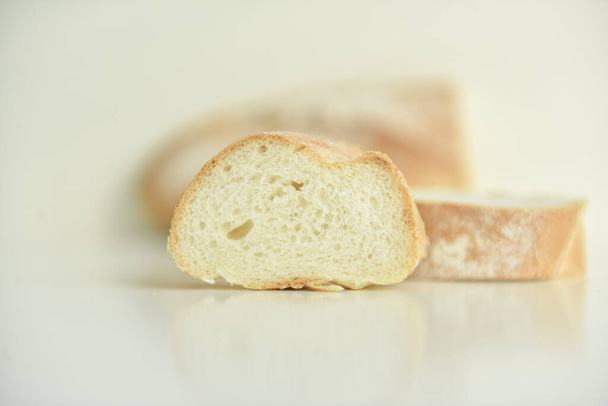 white wheat bread with a toasted crust - Foto, imagen