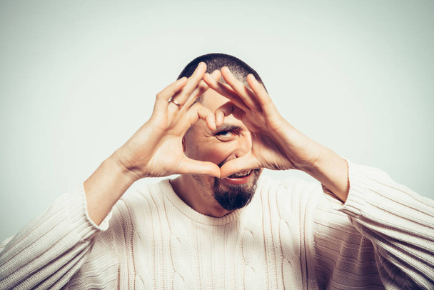 man making a hand heart frame - Фото, зображення