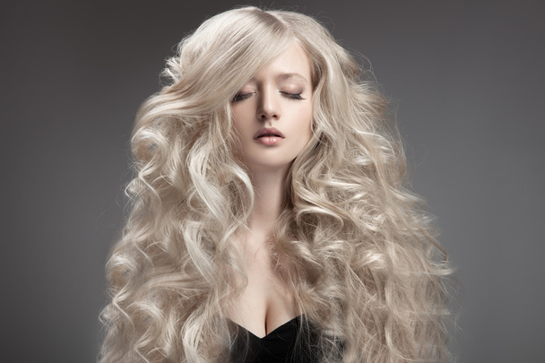 Beautiful Blond Woman. Curly Long Hair - Zdjęcie, obraz
