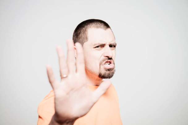 Businessman shows stop gesture - Photo, image