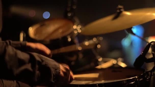 Male man drummer playing drums on stage close-up . Kyiv. Ukraine - Filmmaterial, Video