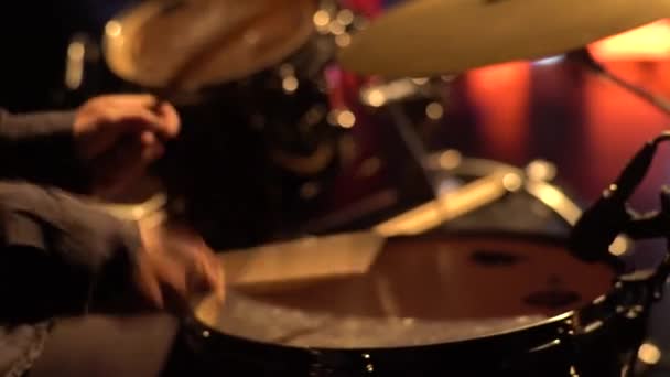 Male man drummer playing drums on stage close-up . Kyiv. Ukraine - Materiał filmowy, wideo