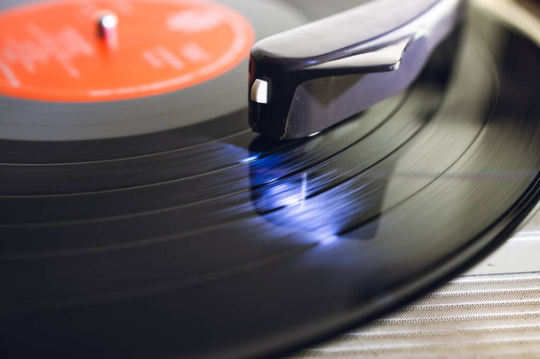 Close up of vinyl record player on a white background. Shallow depth of field, focus select. - Photo, Image